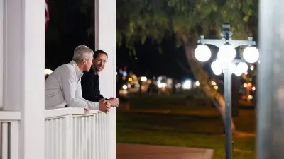 Michael Johnson and Jeff Bartel at the R. Jack Mercer Ontario Community Bandstand, inspecting the newly installed streetlights.
