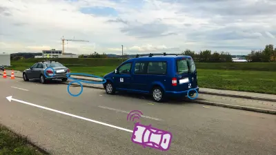 A combined image consisting of a photograph and graphic elements, illustrating how a driving car takes radar images of parked cars and other obstacles.
