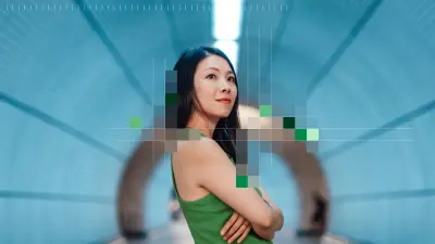 A woman stands in a tunnel, looking confidently upward. Parts of the image are overlaid with colorful pixel blocks.