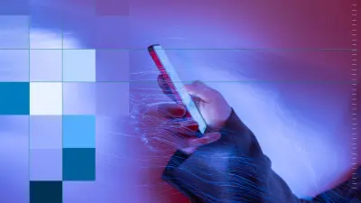 A hand reaches into a glowing, futuristic light field. Parts of the image are overlaid with colorful pixel blocks.