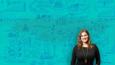 Catharina van Delden in front of a moodboard with sketches