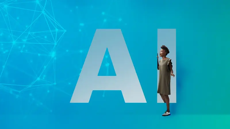 A woman stands in front of an artificial blue surface and explores her surroundings in a virtual world. The picture shows the letters "AI", which stands for artificial intelligence.