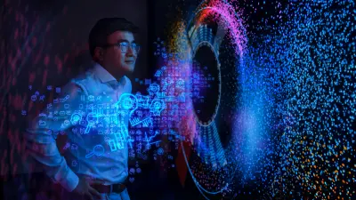 Liu Ren arbeitet am Bosch Research and Technology Center im Silicon Valley. Er steht vor einem wandgroßen Display und erklärt wie künstliche Intelligenz bei Visual Analytics funktioniert.