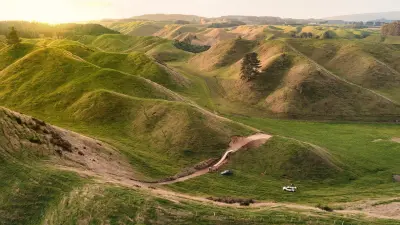 Drone shot of green hills in Australia, Dirt World
